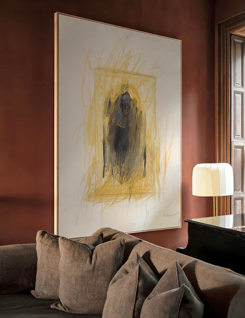 a large abstract canvas art hanging on the living room's wall