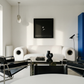 Modern living room with white sofa, black coffee table, and blue cabinet. Bird 2 – Elegant Nature Canvas Print | Luxury Wall Art | Brume Art