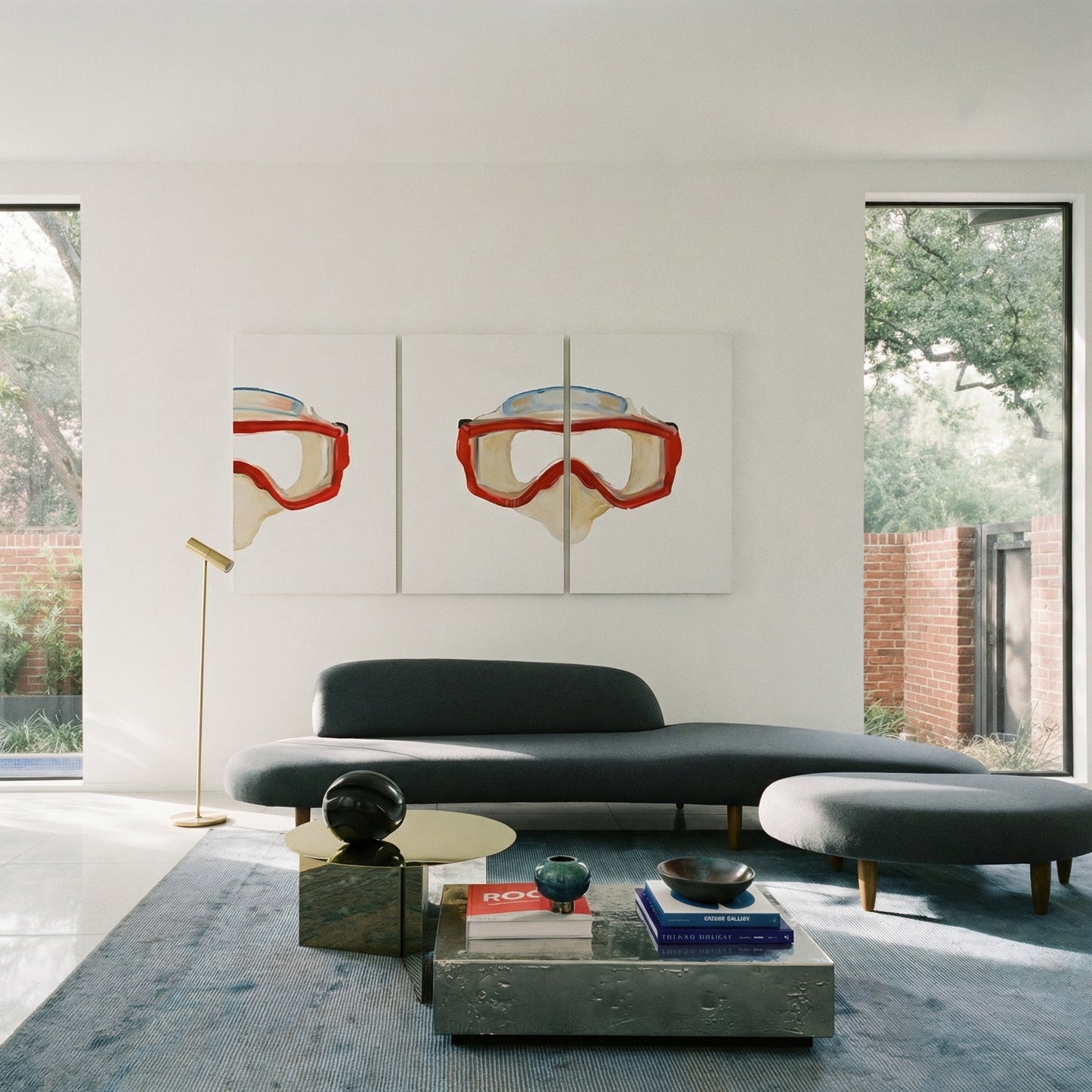 Modern living room with a gray sofa, coffee table, and wall art of goggles. Diving Mask – Unique Figurative Canvas Art | Premium Wall Decor | Brume Art
