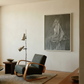 Modern living room with a gray armchair, side table, and artwork on the wall. Still 2 – Serene Abstract Canvas Print | Premium Luxury Wall Art | Brume Art