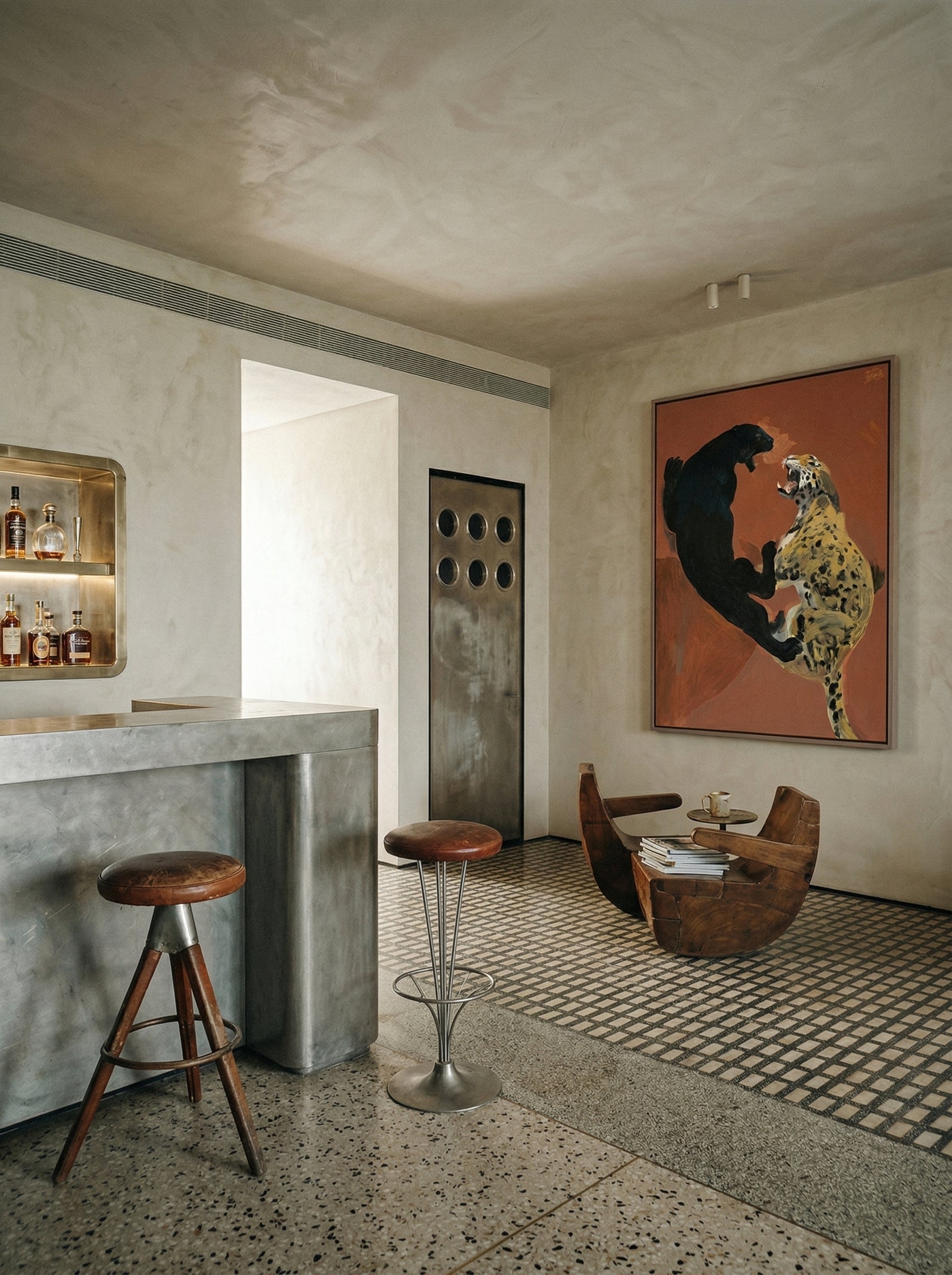 Modern interior with a bar area, stools, and a large abstract painting on the wall. Clash – Dynamic Abstract Canvas Print | Large Modern Wall Art | Brume Art