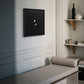 Modern interior with a bench, framed artwork, and shelves. Bird 2 – Elegant Nature Canvas Print | Luxury Wall Art | Brume Art