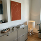 Room interior with a dresser, lamp, and abstract art on the wall. Presence 2 – Figurative Abstract Canvas | Premium Wall Art | Brume Art