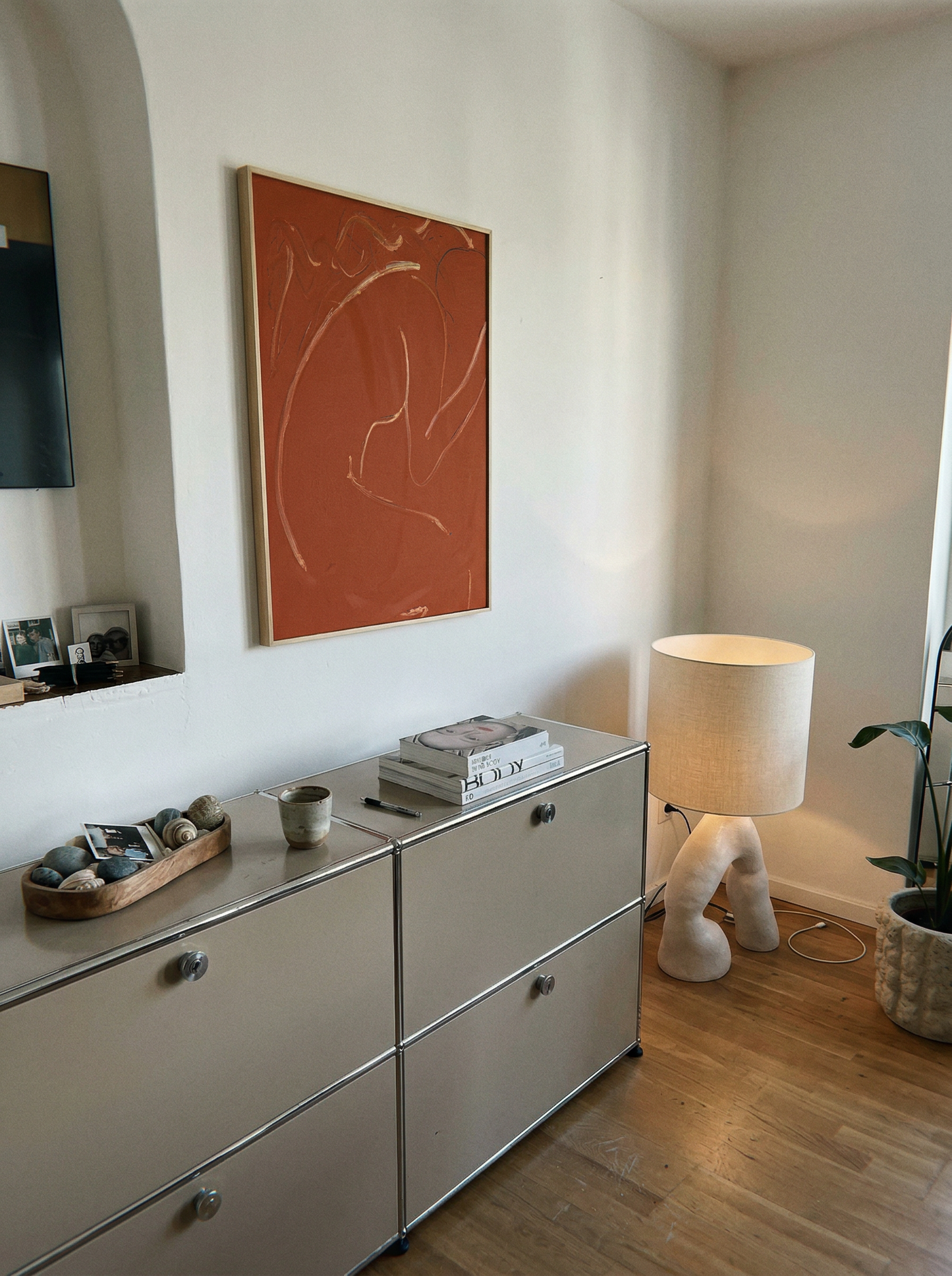 Room interior with a dresser, lamp, and abstract art on the wall. Presence 2 – Figurative Abstract Canvas | Premium Wall Art | Brume Art
