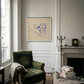 Cozy living room with a green armchair, fireplace, and framed artwork. Presence 3 – Figurative Abstract Canvas | Premium Wall Art | Brume Art | Luxury Wall Decor | Large Canvas Wall Art | Oversized Wall Hanging-Brume art