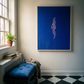 Room interior with a blue abstract painting on a white wall, a blue cushioned bench, and a window with a plant. in the blue – Figurative Canvas Print | Modern Luxury Wall Art | Brume Art