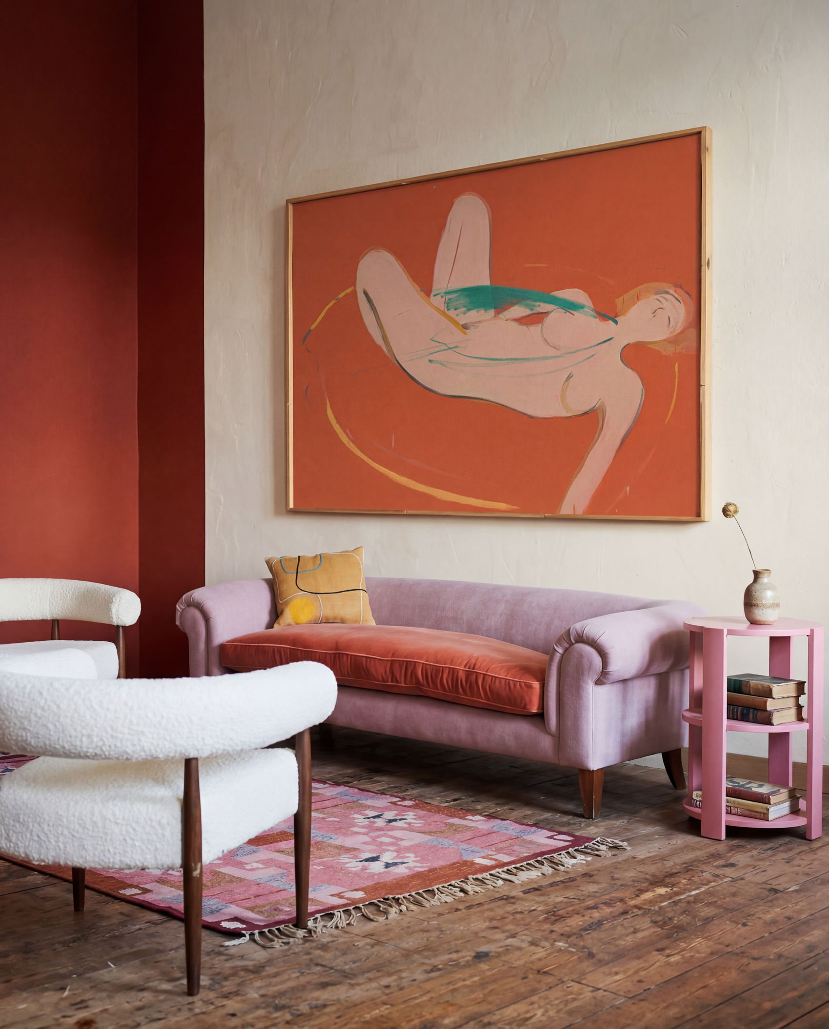Living room with a pink sofa, white armchair, and abstract painting on the wall.  Envelope in Orange – Warm Abstract Canvas Art | Luxury Wall Decor | Brume Art
