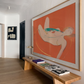 Modern interior with a large abstract painting on the wall and a wooden bench below it. Envelope in Orange – Warm Abstract Canvas Art | Luxury Wall Decor | Brume Art