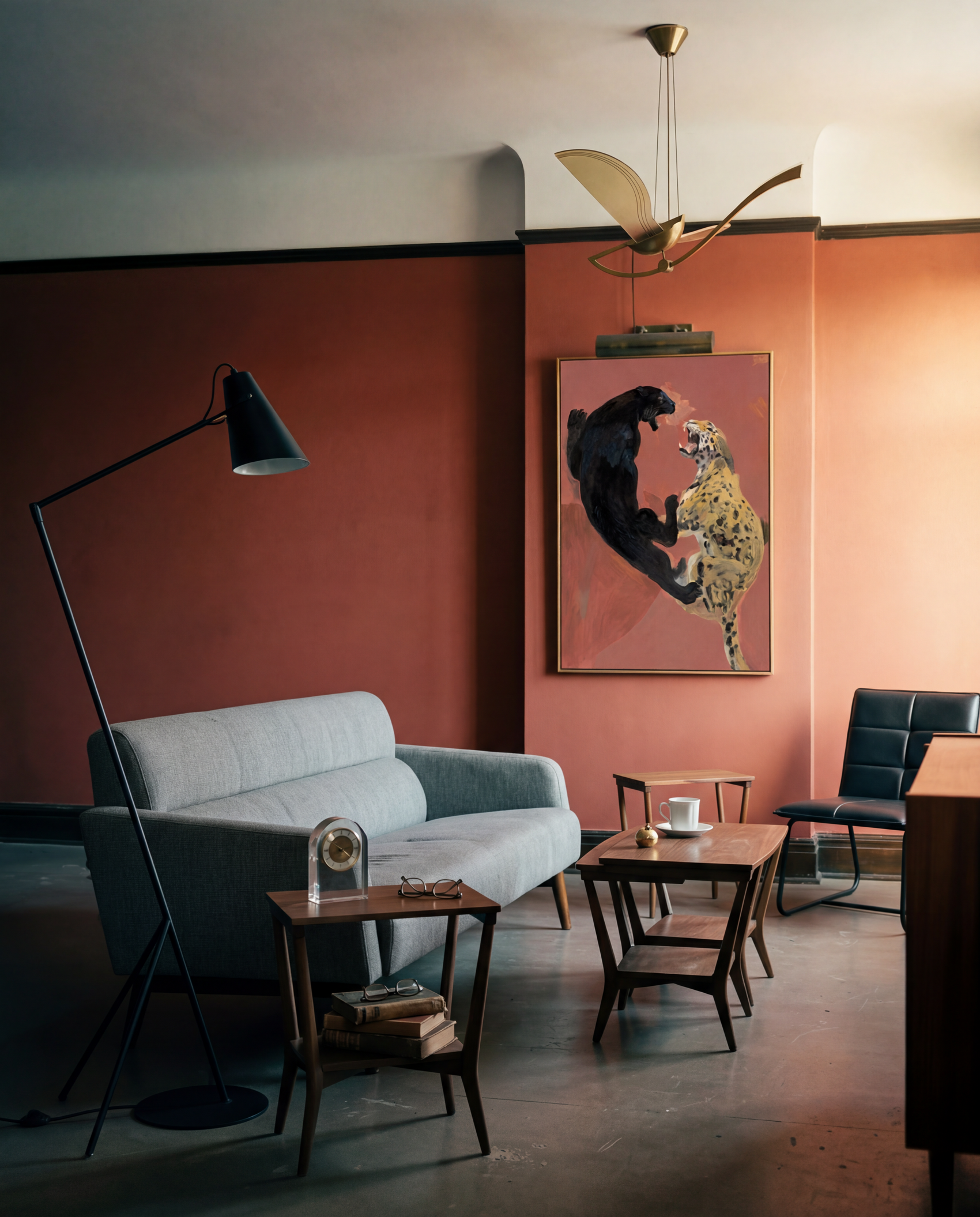 Modern living room with a gray sofa, black chair, and wall art. Clash – Dynamic Abstract Canvas Print | Large Modern Wall Art | Brume Art