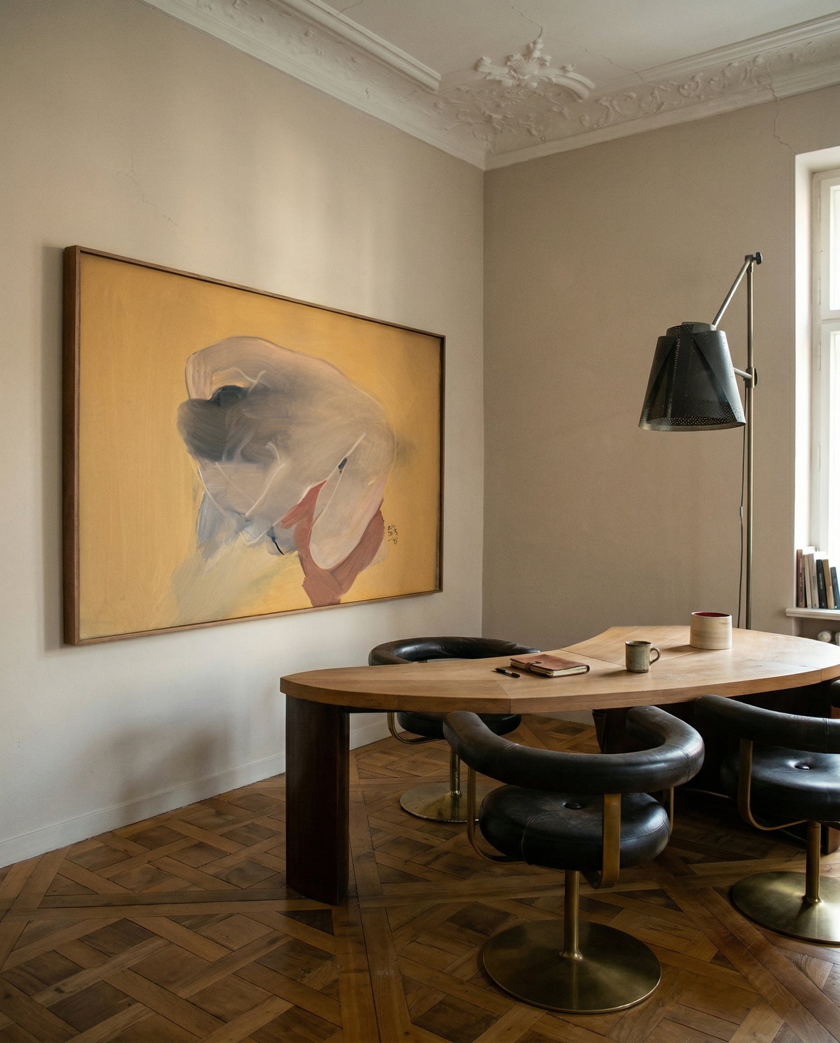 Modern dining room with a round wooden table and black chairs, featuring a large framed artwork on the wall. Soft Body – Figurative Abstract Canvas Print | Premium Wall Art | Brume Art