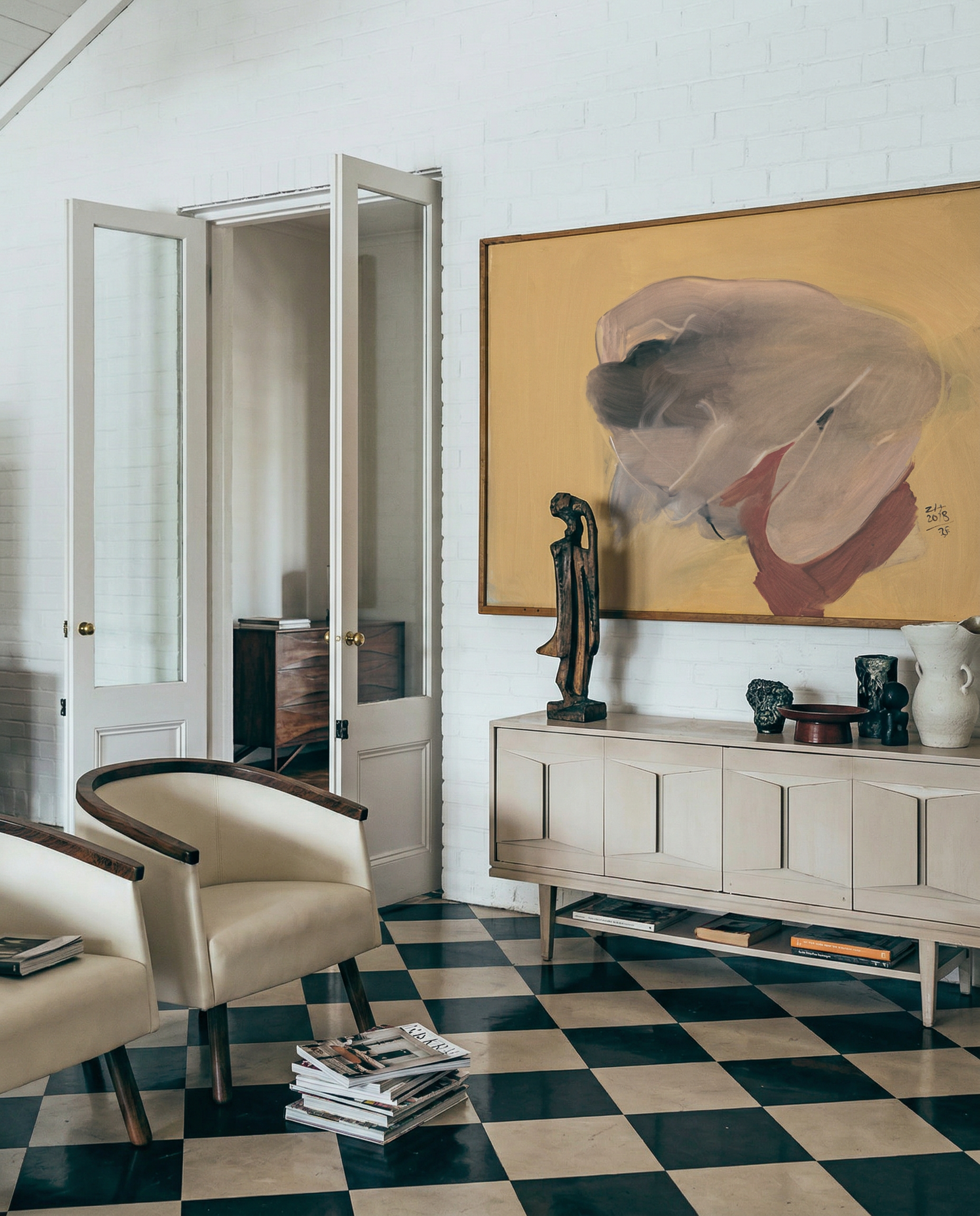 Living room with checkered floor, white walls, and a large painting above a cabinet. Soft Body – Figurative Abstract Canvas Print | Premium Wall Art | Brume Art