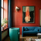 Modern living room with a blue sofa, teal armchair, and red wall. Flame – Expressive Abstract Canvas Art | Large Luxury Wall Print | Brume Art