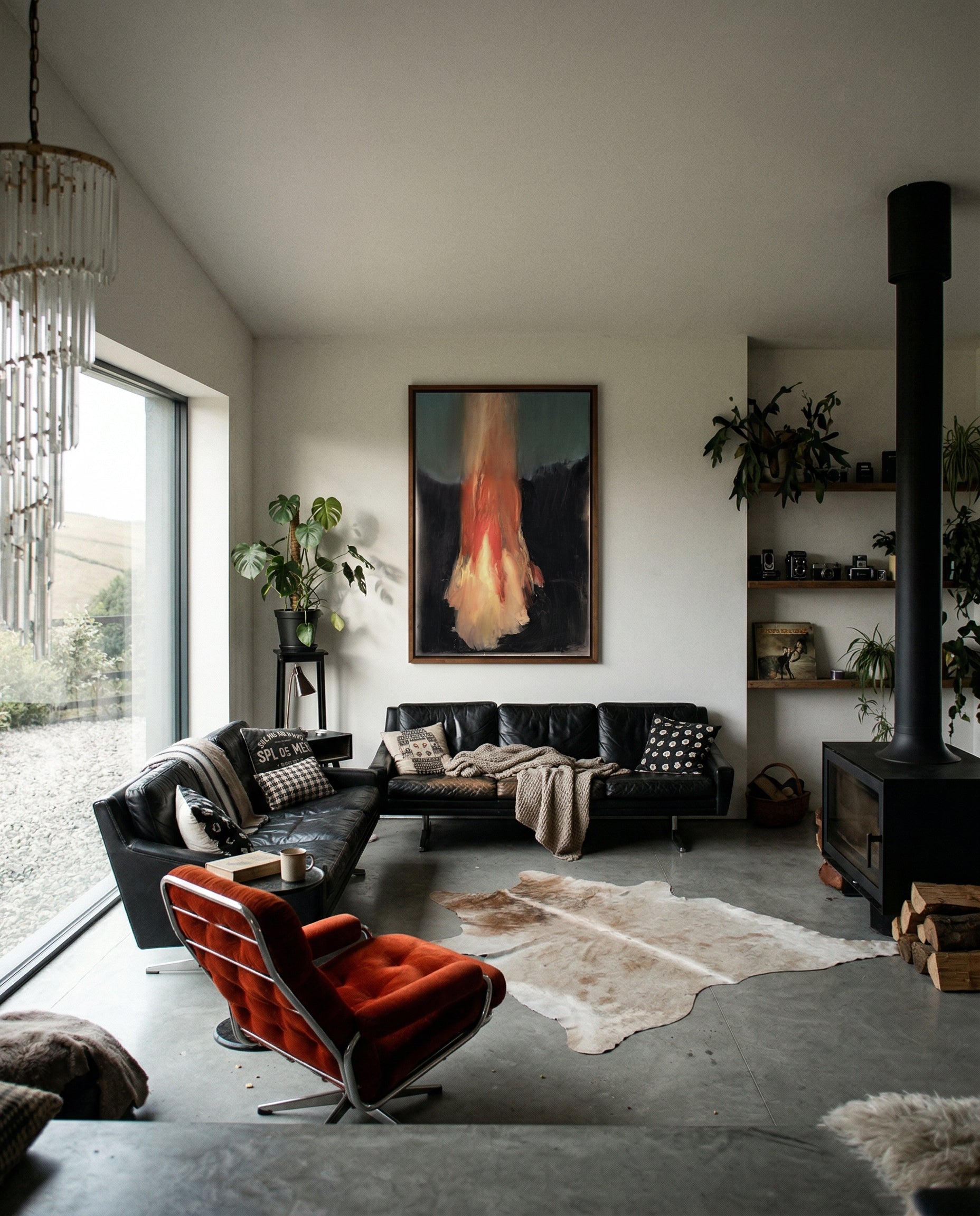 Modern living room with black leather sofa, red armchair, and decorative elements. Flame – Expressive Abstract Canvas Art | Large Luxury Wall Print | Brume Art