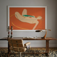 Wooden desk with chair, framed abstract art on wall, and decorative items. Envelope in Orange – Warm Abstract Canvas Art | Luxury Wall Decor | Brume Art