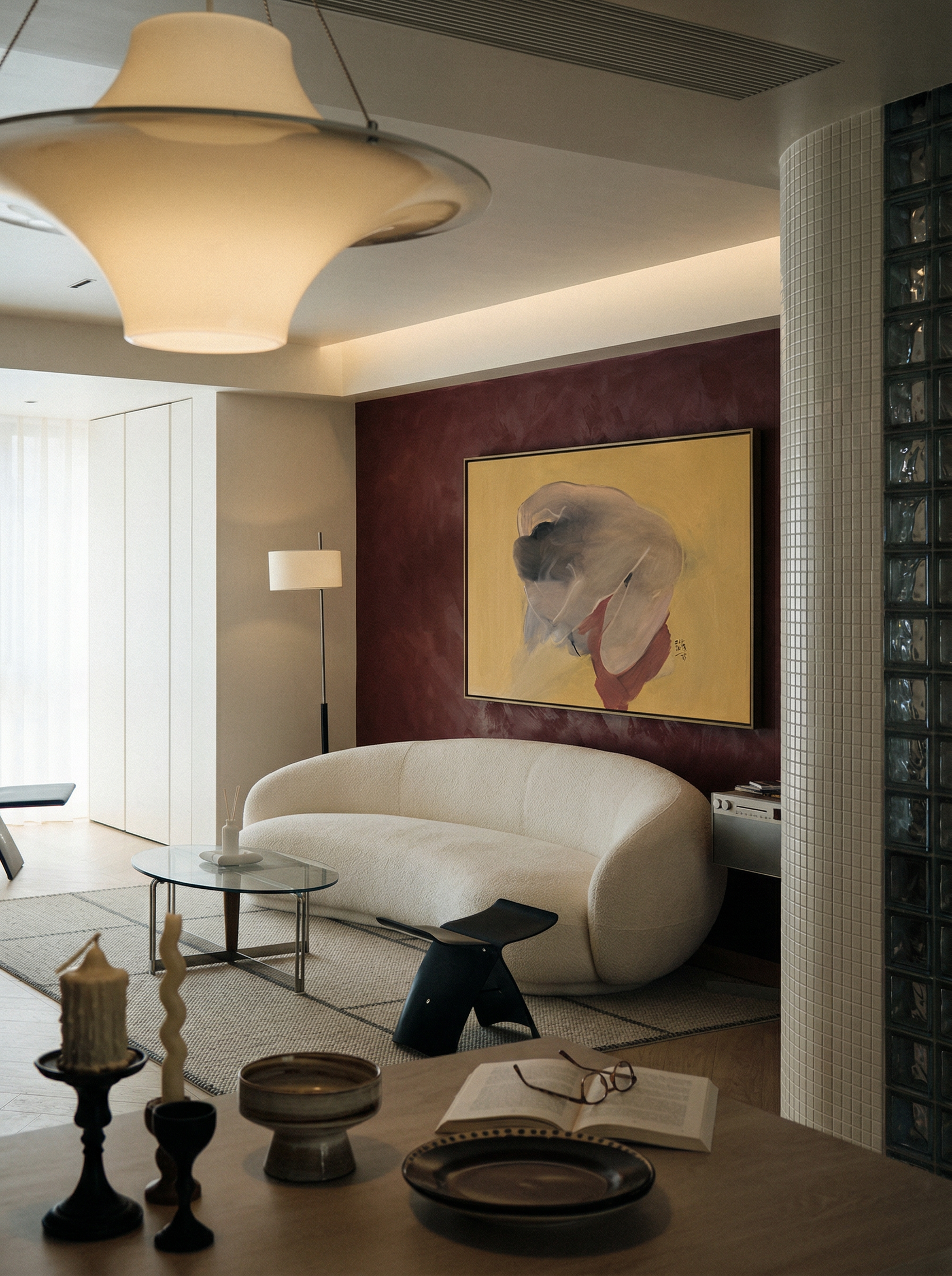 Modern living room with a white sofa, decorative items, and a painting on the wall. Soft Body – Figurative Abstract Canvas Print | Premium Wall Art | Brume Art