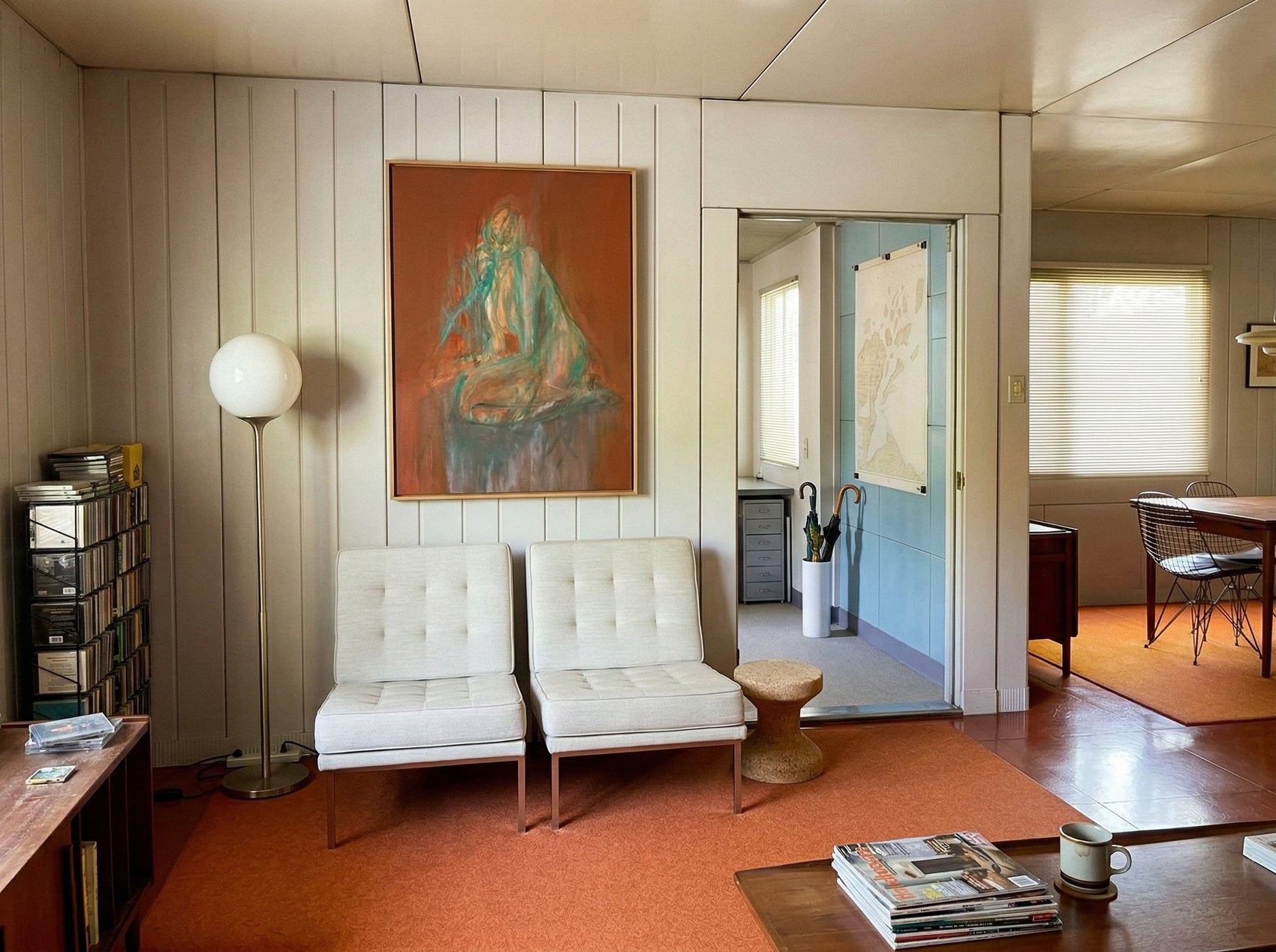 Modern living room with white chairs, a painting on the wall, and a coffee table with books. Still – Minimalist Abstract Canvas Art | Large Luxury Wall Decor | Brume Art