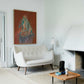 Modern living room with a white sofa, wooden coffee table, and abstract painting on the wall. Still – Minimalist Abstract Canvas Art | Large Luxury Wall Decor | Brume Art