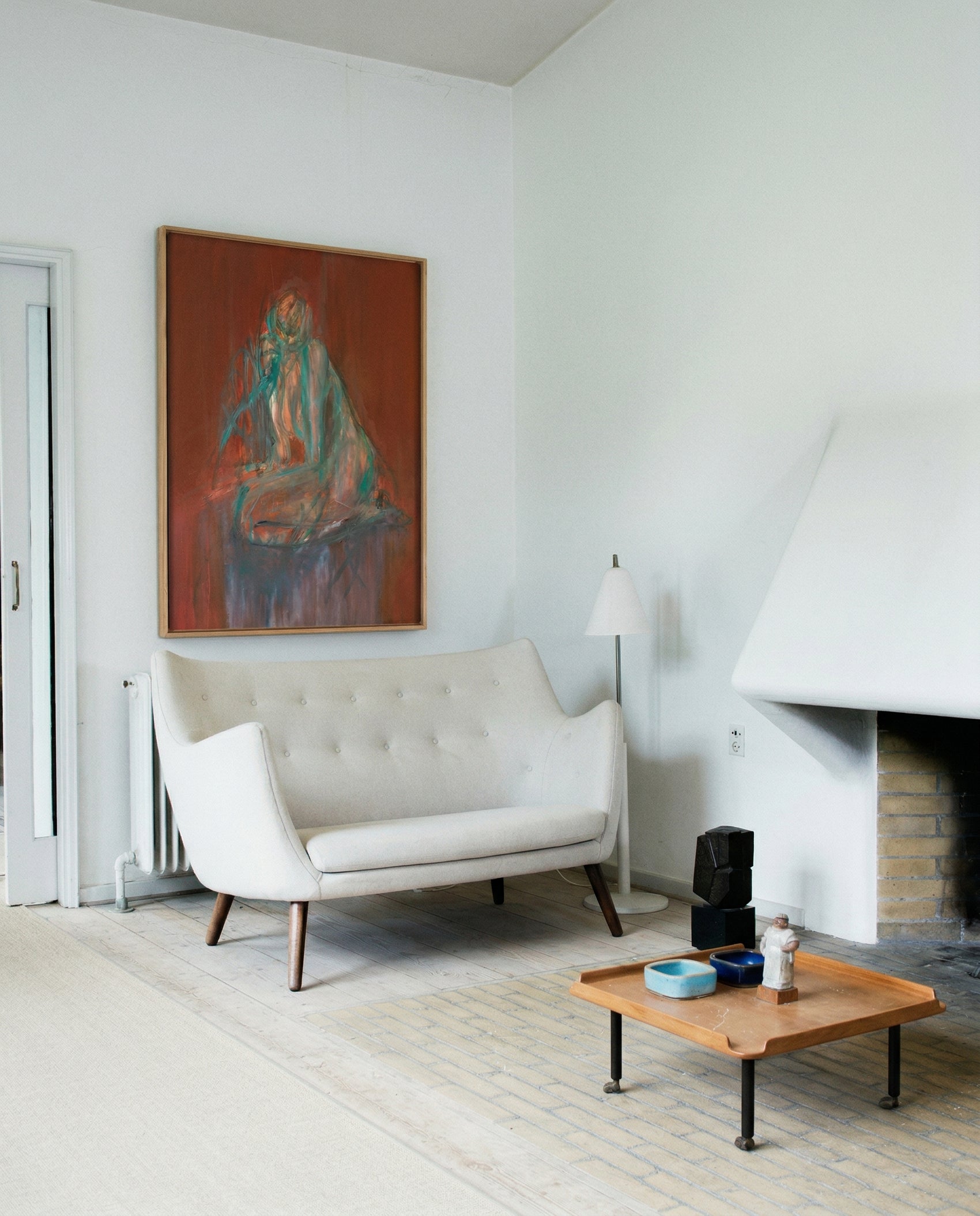 Modern living room with a white sofa, wooden coffee table, and abstract painting on the wall. Still – Minimalist Abstract Canvas Art | Large Luxury Wall Decor | Brume Art