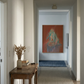 Hallway with a wooden side table, vase with dried plants, and a colorful abstract painting on the wall. Still – Minimalist Abstract Canvas Art | Large Luxury Wall Decor | Brume Art