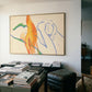 Abstract artwork on a wall above a table with books in a room. Figure and Flame – Figurative Canvas Wall Art | Premium Luxury Print | Brume Art
