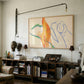 Living room with bookshelf, artwork, and decorative items. Figure and Flame – Figurative Canvas Wall Art | Premium Luxury Print | Brume Art