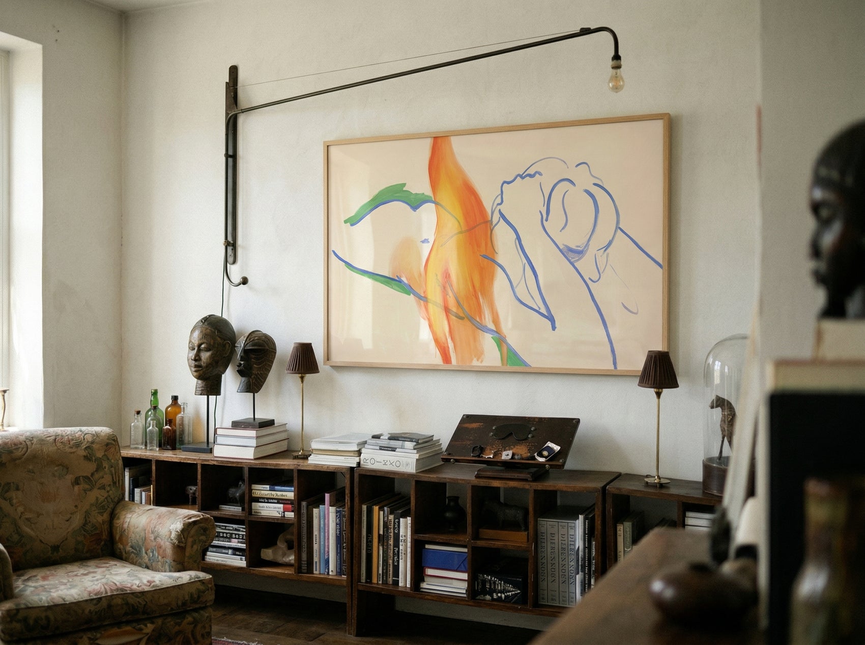 Living room with bookshelf, artwork, and decorative items. Figure and Flame – Figurative Canvas Wall Art | Premium Luxury Print | Brume Art