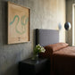 Modern bedroom with abstract art on the wall, a bed, and a vase with flowers. Green Snake 2 – Nature Canvas Wall Art | Premium Luxury Print | Brume Art