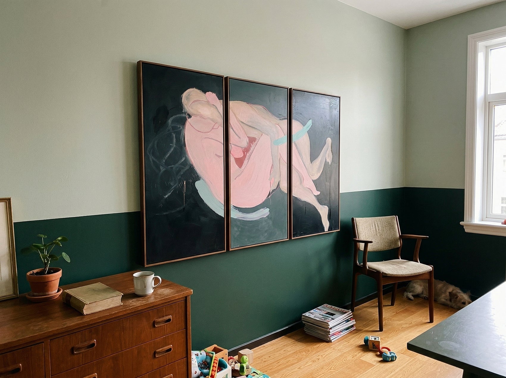 Room interior with abstract art on the wall, wooden furniture, and toys on the floor. Embrace – Figurative Canvas Wall Art | Oversized Luxury Print | Brume Art