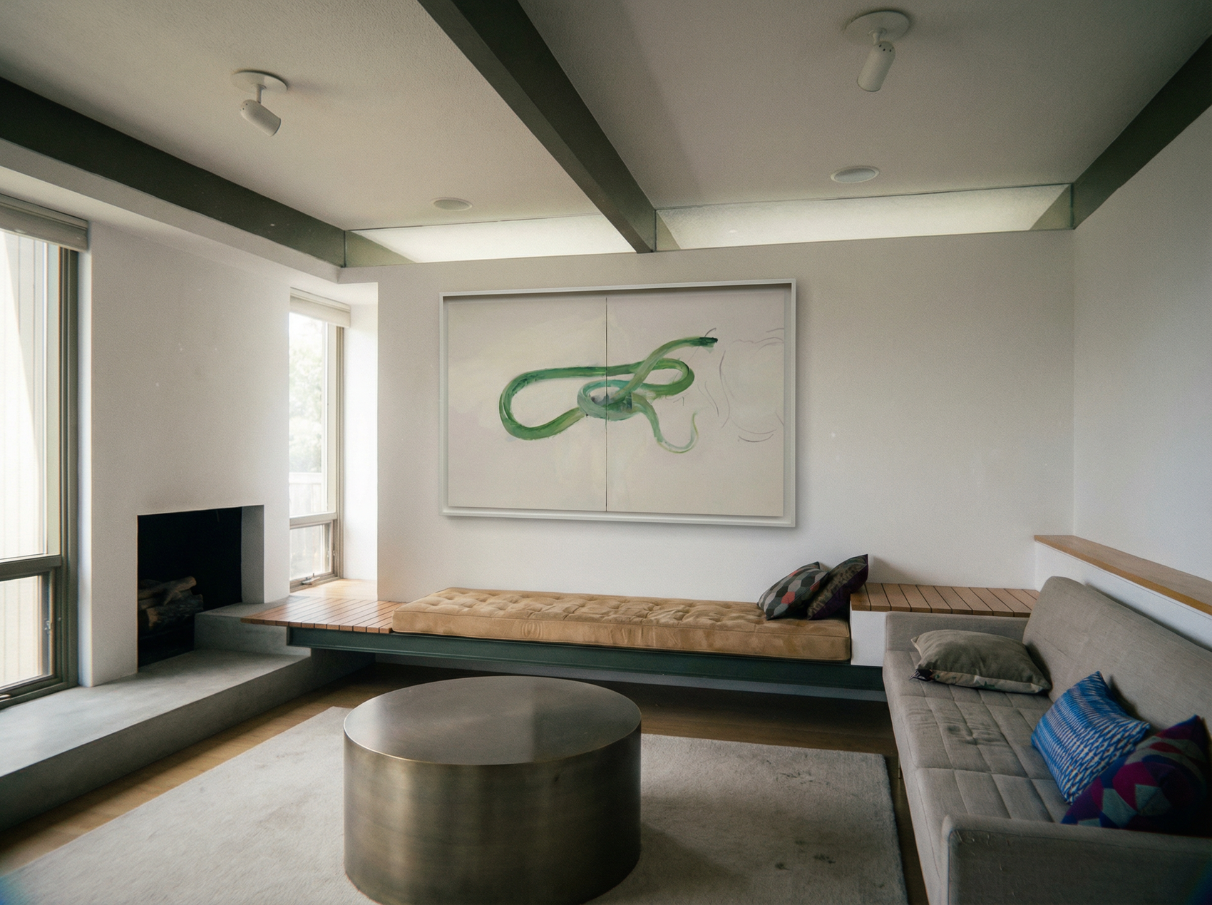 Modern living room with a fireplace, artwork on the wall, and a sofa. Green Snake – Nature Canvas Wall Art | Large Luxury Print | Brume Art
