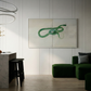 Modern interior with green sofa, abstract painting, and marble countertop. Green Snake – Nature Canvas Wall Art | Large Luxury Print | Brume Art