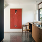 Modern kitchen with a red painting of a woman on the wall The Woman in Red – Portrait Canvas Wall Art | Large Luxury Print | Brume Art
