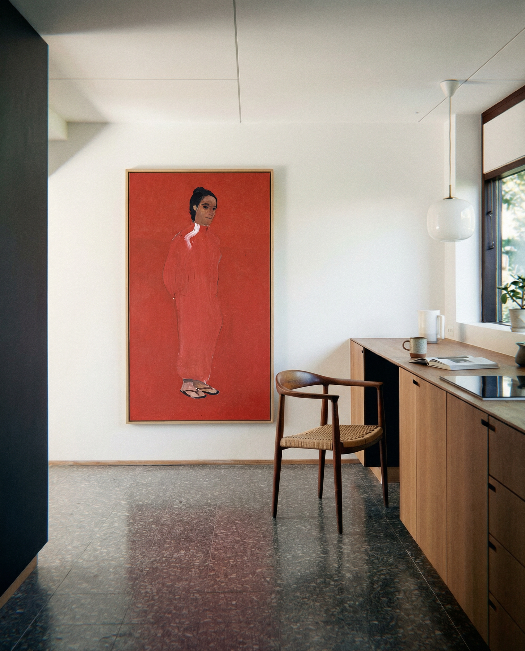 Modern kitchen with a red painting of a woman on the wall The Woman in Red – Portrait Canvas Wall Art | Large Luxury Print | Brume Art
