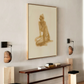 Modern interior with a framed artwork, wall sconces, and a console table. Still 3 – Serene Abstract Canvas Print | Premium Luxury Wall Art | Brume Art