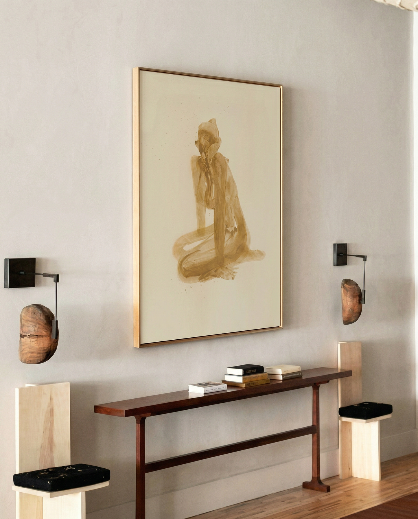 Modern interior with a framed artwork, wall sconces, and a console table. Still 3 – Serene Abstract Canvas Print | Premium Luxury Wall Art | Brume Art