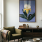 Living room with a green armchair, coffee table, and wall art of a flower. Iris – Botanical Canvas Wall Art | Premium Luxury Print | Brume Art