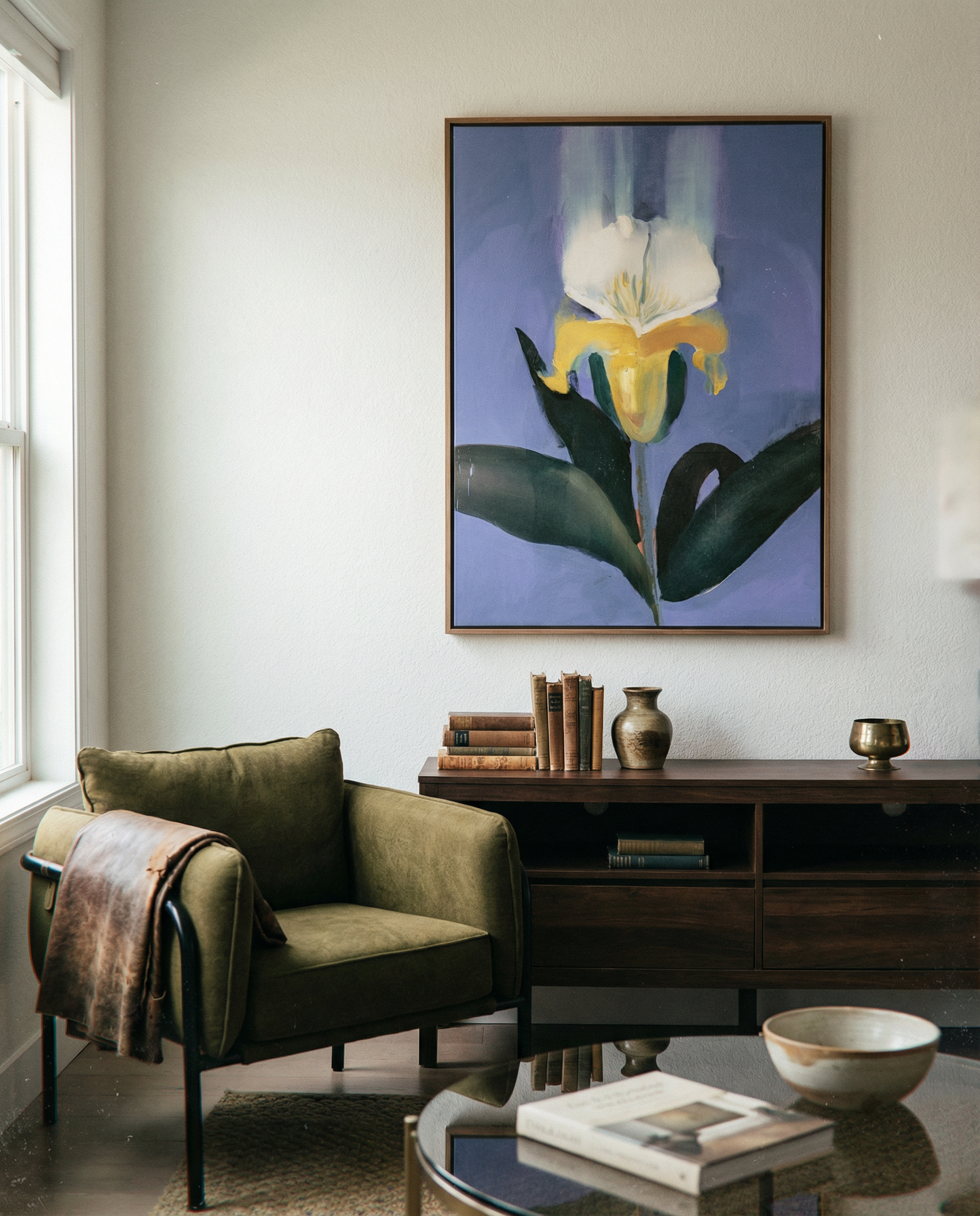 Living room with a green armchair, coffee table, and wall art of a flower. Iris – Botanical Canvas Wall Art | Premium Luxury Print | Brume Art