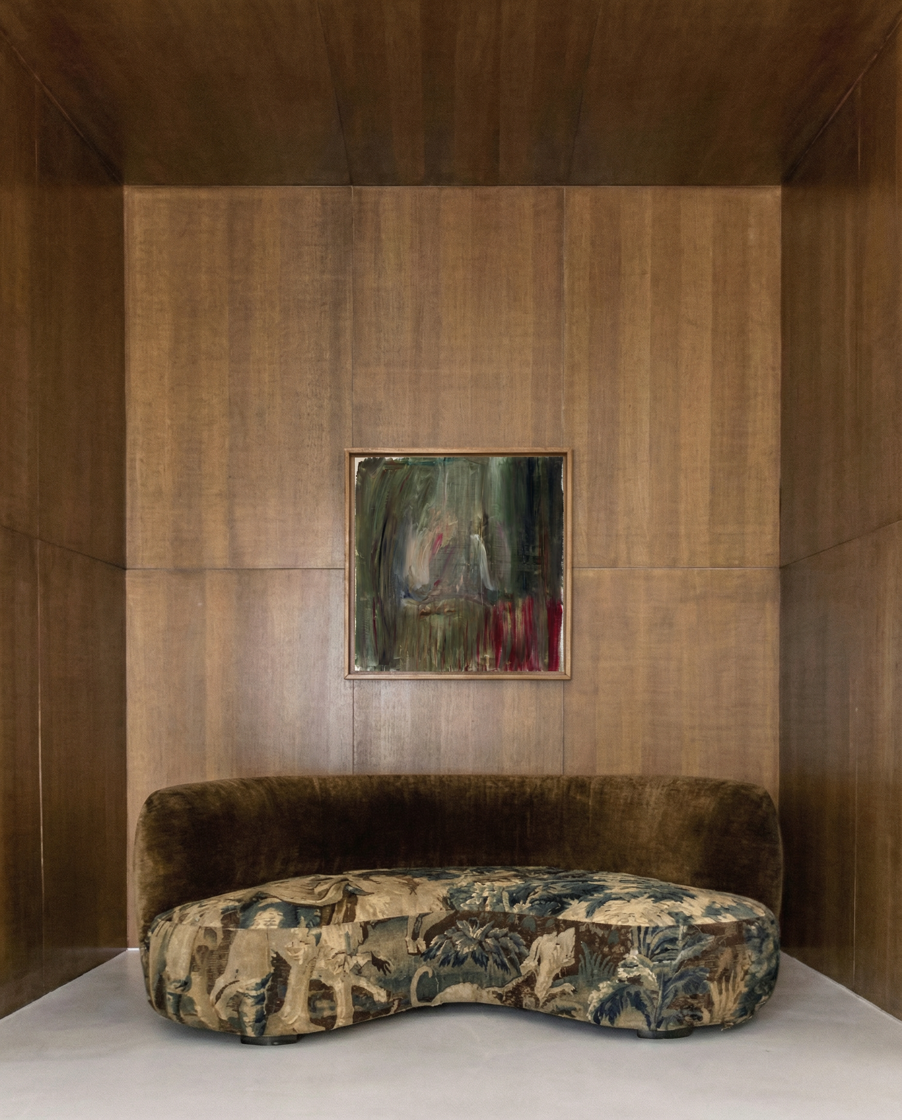 Decorative sofa with patterned cushions against a wooden paneled wall with a painting. Field green – Bold Abstract Canvas Wall Art | Large Luxury Print | Brume Art 