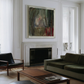 Modern living room with a fireplace, sofa, and abstract painting. Field green – Bold Abstract Canvas Wall Art | Large Luxury Print | Brume Art 