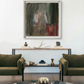 Modern living room with olive green sofa, round coffee table, and abstract painting on white wall. Field green – Bold Abstract Canvas Wall Art | Large Luxury Print | Brume Art 