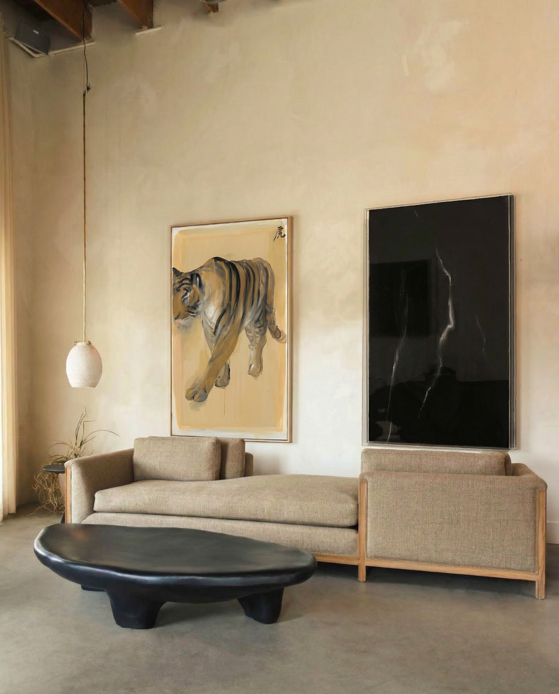 Modern living room with a beige sofa, black coffee table, and wall art of a tiger. Tiger – Contemporary Animal Canvas Art | Luxury Wall Decor | Brume Art