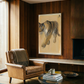 Living room with a brown leather armchair, coffee table, and tiger painting on wooden wall. Tiger – Contemporary Animal Canvas Art | Luxury Wall Decor | Brume Art