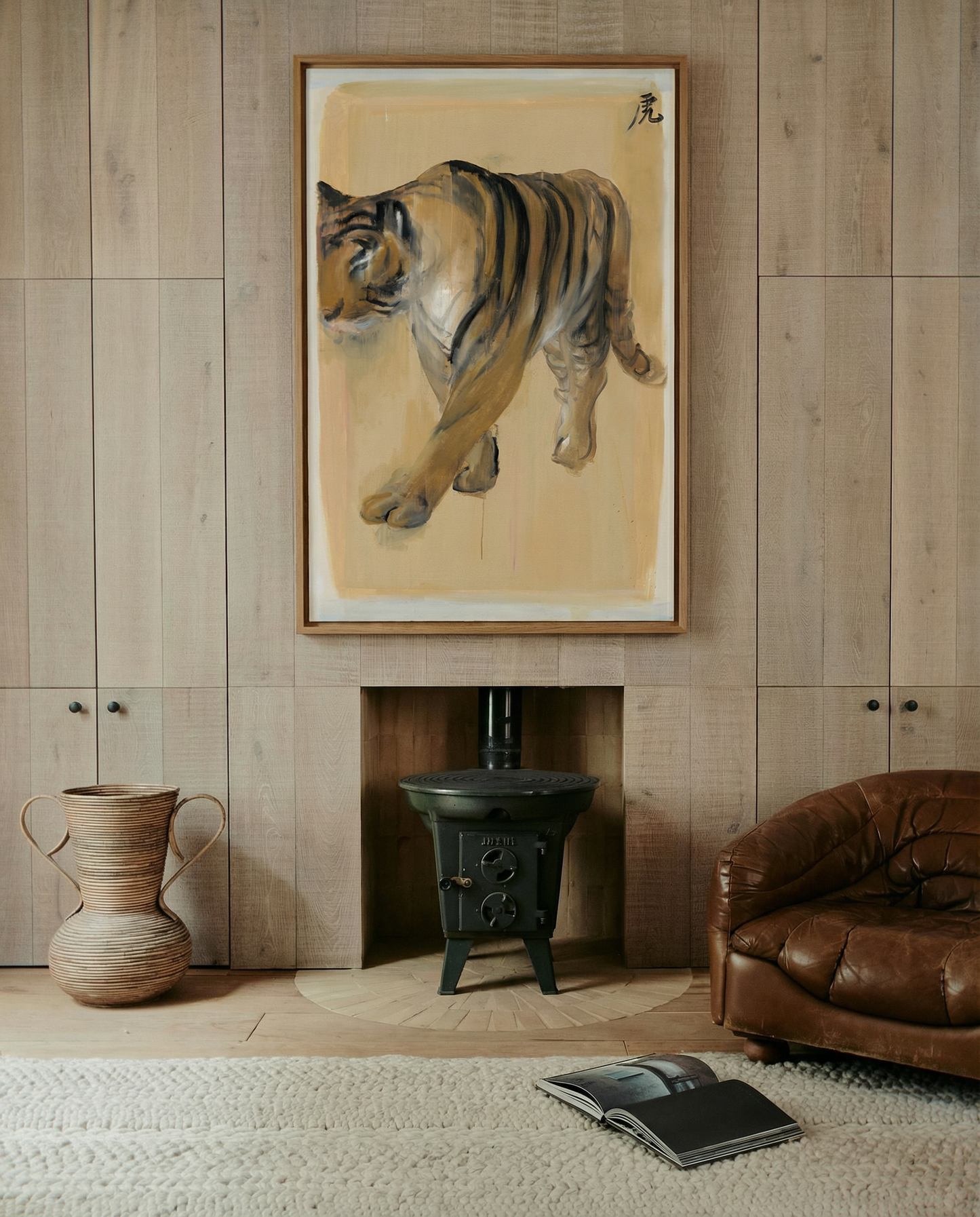 Living room with a tiger painting on the wall, brown leather chair, and wooden vase. Tiger – Contemporary Animal Canvas Art | Luxury Wall Decor | Brume Art