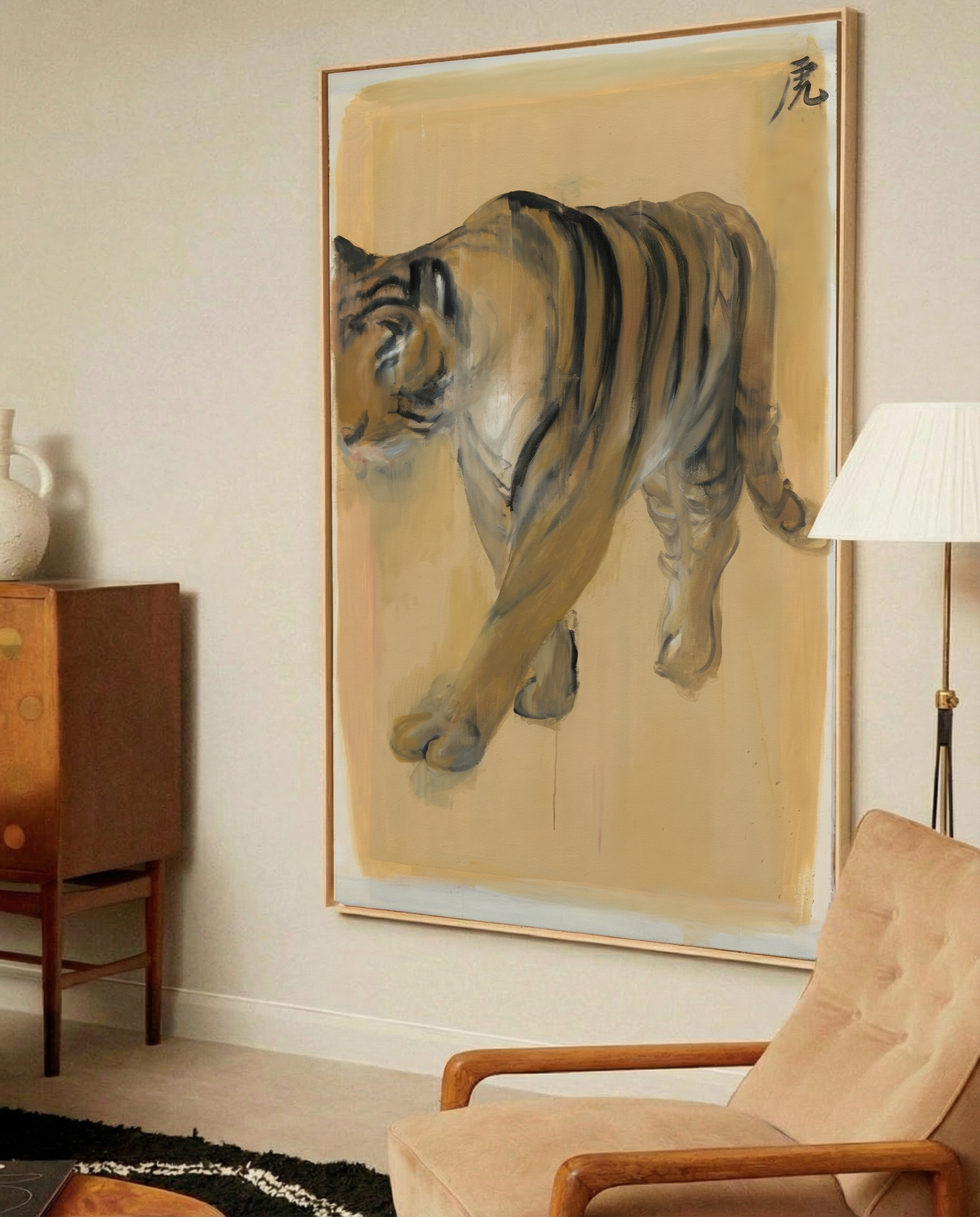 Framed artwork of a tiger on a wall in a room with a chair and lamp. Tiger – Contemporary Animal Canvas Art | Luxury Wall Decor | Brume Art