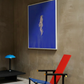 Modern chair with blue and red design in a room with a abstract painting on the wall. in the blue – Figurative Canvas Print | Modern Luxury Wall Art | Brume Art