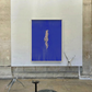 Abstract sculpture with a blue panel featuring a nude figure in a gallery setting. in the blue – Figurative Canvas Print | Modern Luxury Wall Art | Brume Art