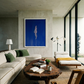 Modern living room with a large abstract painting on the wall, a wooden coffee table, and comfortable seating. in the blue – Figurative Canvas Print | Modern Luxury Wall Art | Brume Art