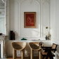 Elegant interior with ornate white walls, a fireplace, and modern furniture. Noise – Abstract Canvas Art | Large Luxury Wall Print | Brume Art