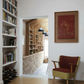 Living room with bookshelves, armchair, and framed artwork on a white wall. Noise – Abstract Canvas Art | Large Luxury Wall Print | Brume Art