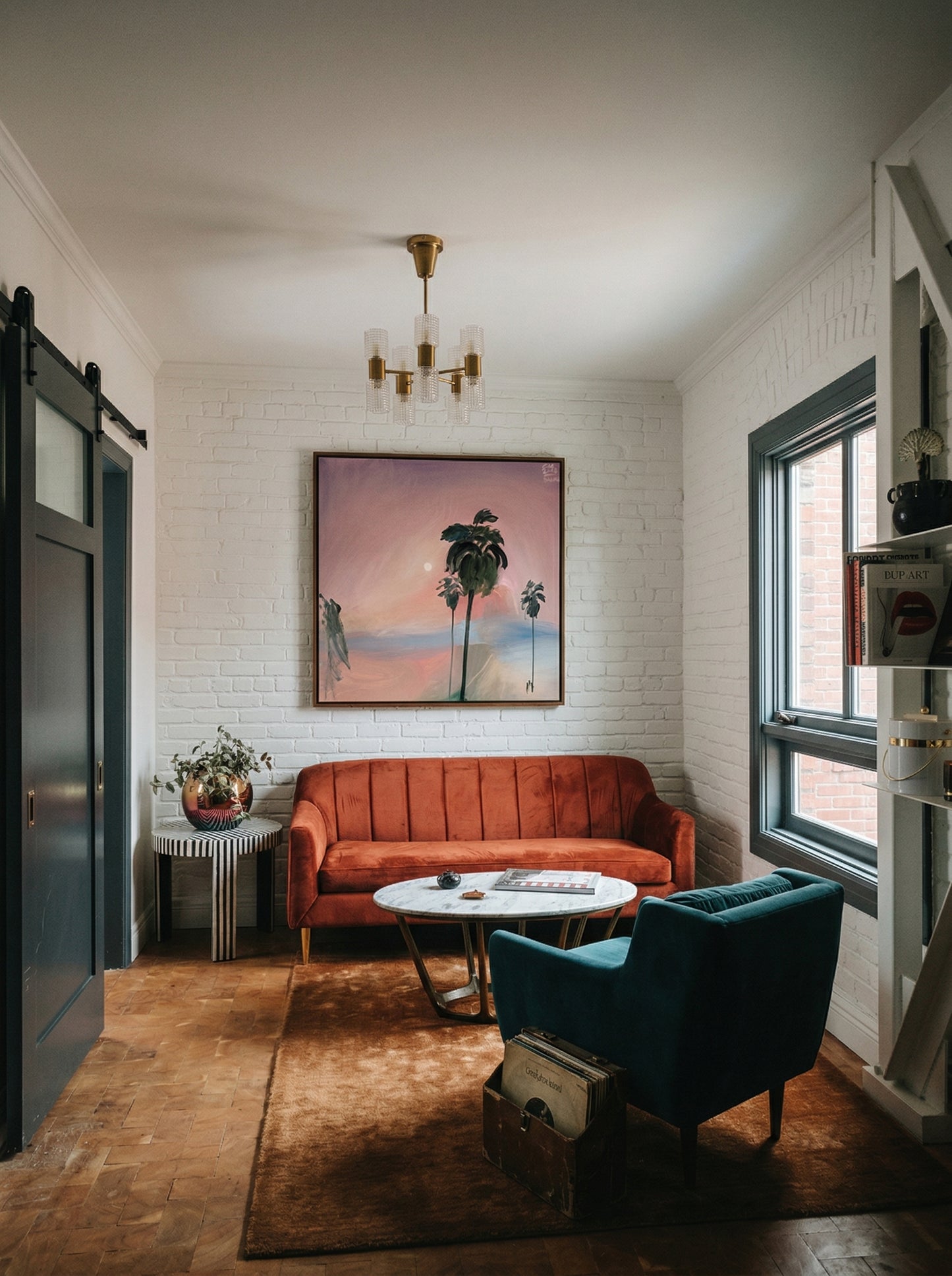 Living room with orange sofa, blue armchair, and framed artwork on white brick wall. Palm tree – Landscape Canvas Wall Art | Large Luxury Print | Brume Art 
