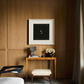 Modern interior with wooden wall, table, chair, and framed artwork. Bird 2 – Elegant Nature Canvas Print | Luxury Wall Art | Brume Art